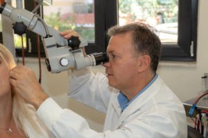 doctor examining patient